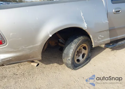 2002 Ford F-150 Lariat/Xlt z USA, uszkodzony, nr VIN 1FTRW076X2KA74193